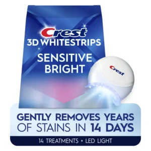 302650e9-8c69-40aa-8b0f-37ed650bc1a5.adcfbae08eb1c18bb8aa3bc6817058bc.webp Crest 3DWhitestrips Sensitive bright + Kit de blanchiment des dents à domicile à lumière LED – 14 traitements